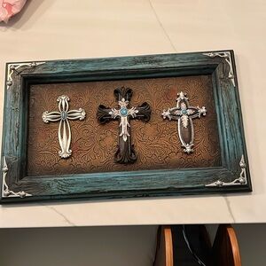 Teal wall art with 3 crosses